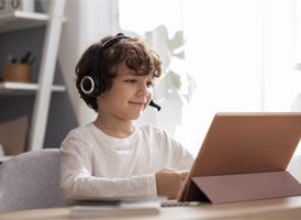 Person studying on a laptop with coffee