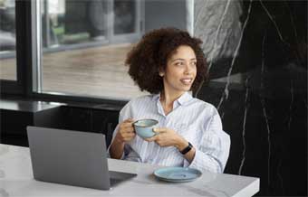 Woman smiling in an office