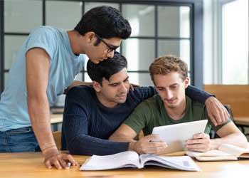 Two students learning in person