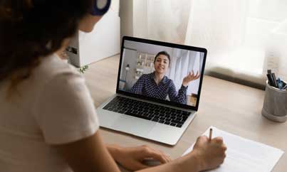 Two students learning in person