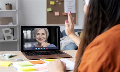 Person studying on a laptop with coffee