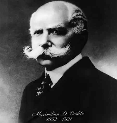 Man looking at phone in a city street