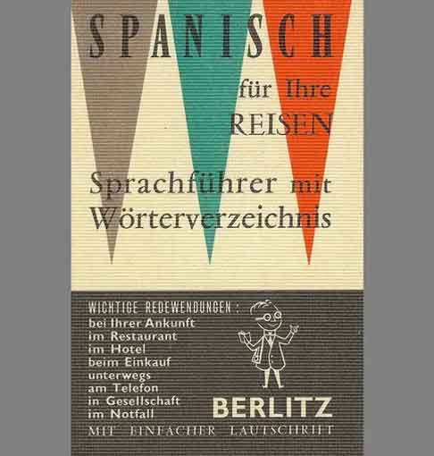 Man looking at phone in a city street