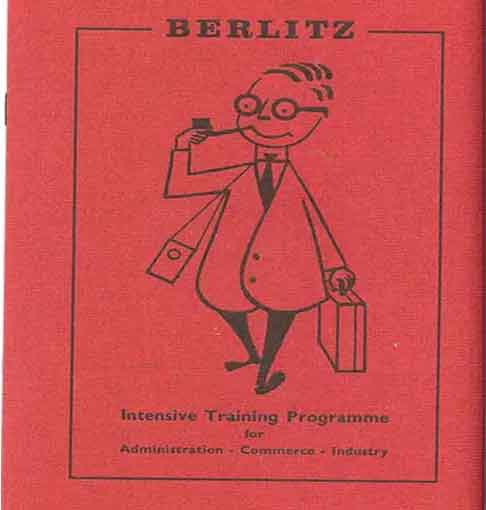 Man looking at phone in a city street