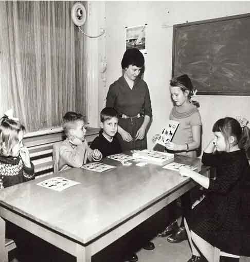 Man looking at phone in a city street